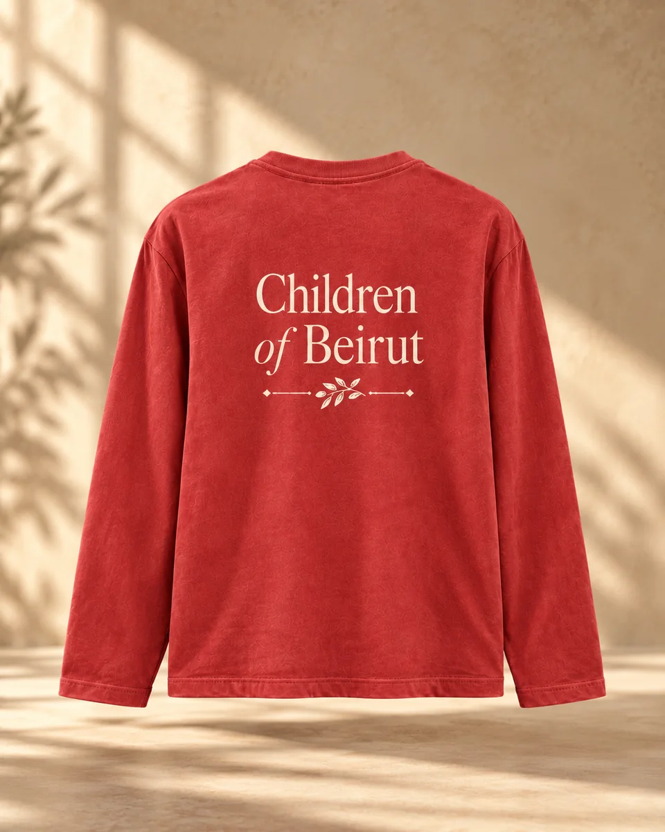 Back of the Beirut Kin washed red long sleeve with Children of Beirut artwork